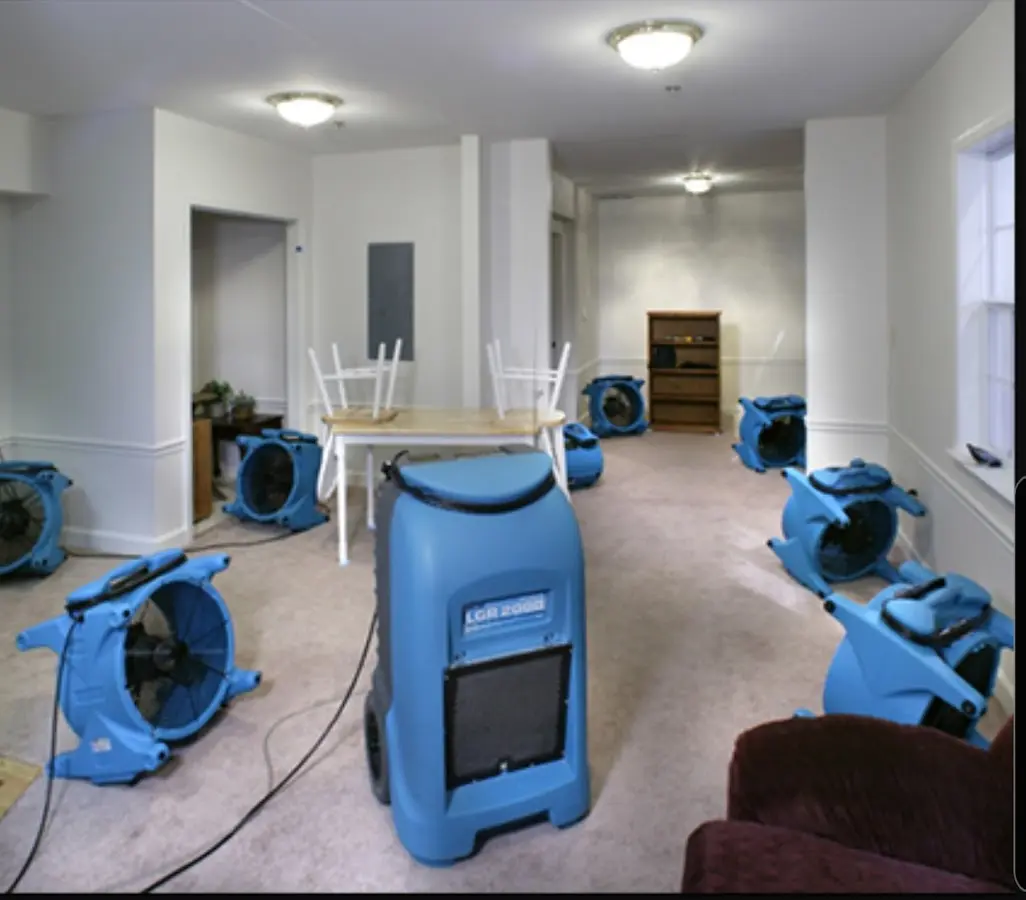 Air movers and dehumidifier setup for Water Damage Restoration in Dunbar